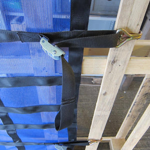Detail of a load control net with hook and cam buckle.