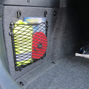 Bespoke frame elastic net to provide additional storage on the side of a car boot (customer photo).