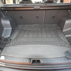Bespoke elastic net to cover the area in a car boot (customer photo).
