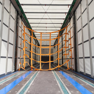 An example of a webbing load control or partition net in the back of a truck.