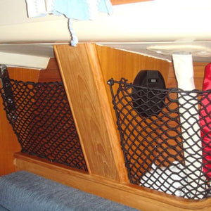 Bespoke elastic nets to create extra storage space on a boat (customer photo).