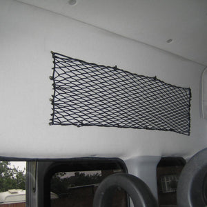 Bespoke elastic net to create storage space on the inside of a van (customer photo).
