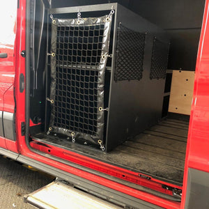 Custom-made frame elastic nets for additional storage space, and a barrier net in front of shelving on a fire training vehicle (customer photo).