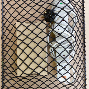 Custom-made frame elastic net for storage.