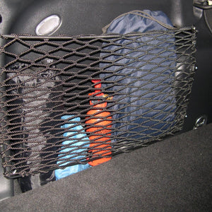 Bespoke frame elastic net to provide additional storage on the side of a car boot (customer photo).