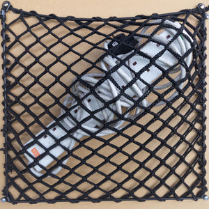 Bespoke double layer frame elastic net showing storage of an extension cord.