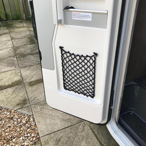 Custom frame elastic net for shoe storage at the back of a van (customer photo).