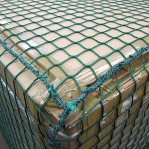 Close-up of a dark green pallet cover net.