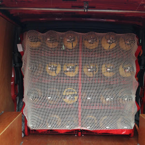Bespoke load control net to cover cylinders at the back of a commercial vehicle (customer photo).