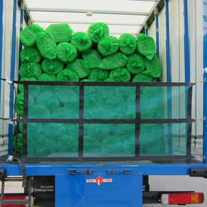 Load restraint mesh net with webbing and fittings on the back of a truck (customer photo).