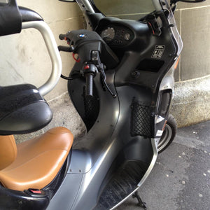 Small bespoke elastic net to provide storage for a water bottle on a motorcycle (customer photo).