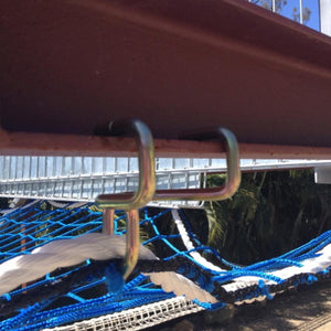 Net Claw used for installing safety netting in use on a steel beam.