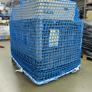 Large blue pallet cover net with border rope.