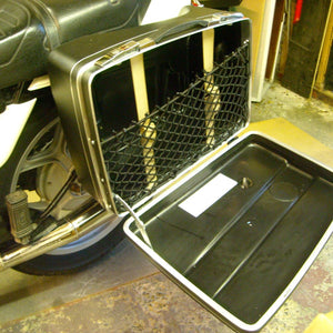 Bespoke frame elastic net to fit within a metal motorcycle pannier to provide additional storage space (customer photo).