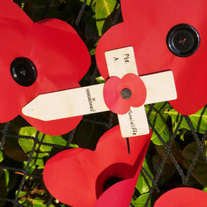 Close-up of netting under the poppies on a Remembrance Day poppy display (customer photo).