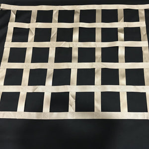 Bespoke tan webbing net for a film production.