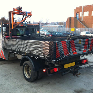 Cargo net covering back of a vehicle trailer (customer photo).