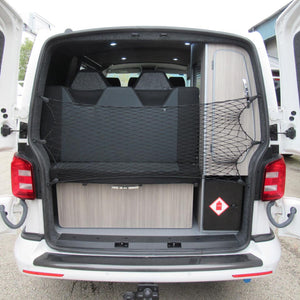 Bespoke elastic net with bungee cord and plastic clips at the back of a van (customer photo).