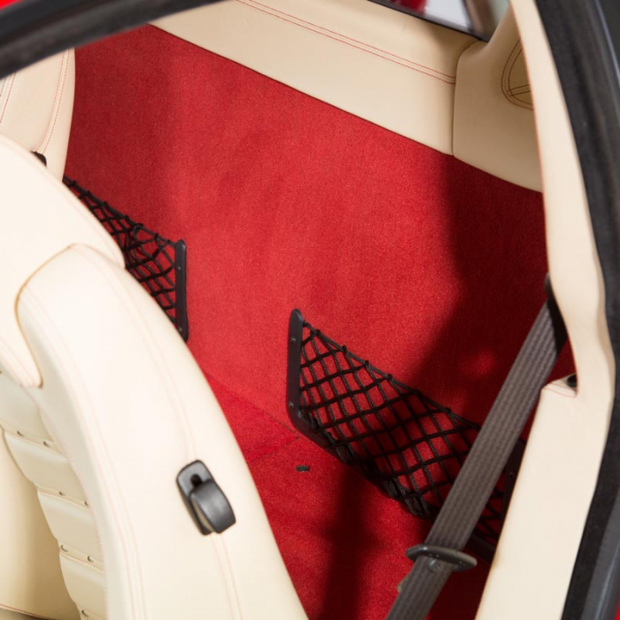 Frame elastic nets behind car seats