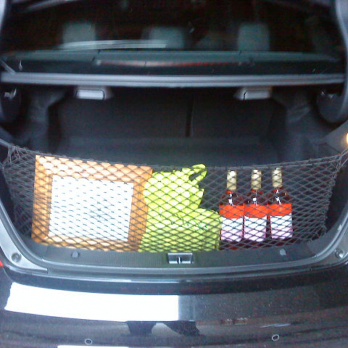 Elastic net in a car boot to help with the organisation and storage of groceries and other small items.