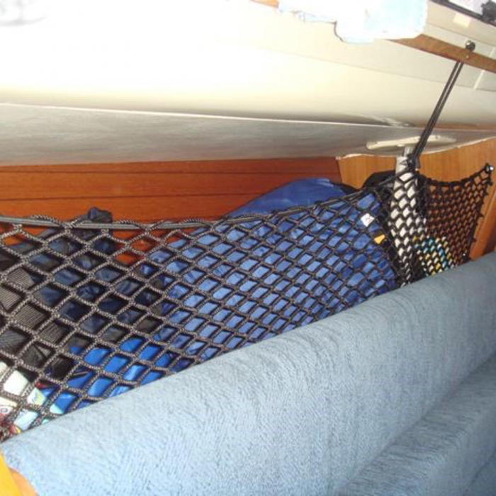 Bespoke elastic net to create extra storage space on a boat