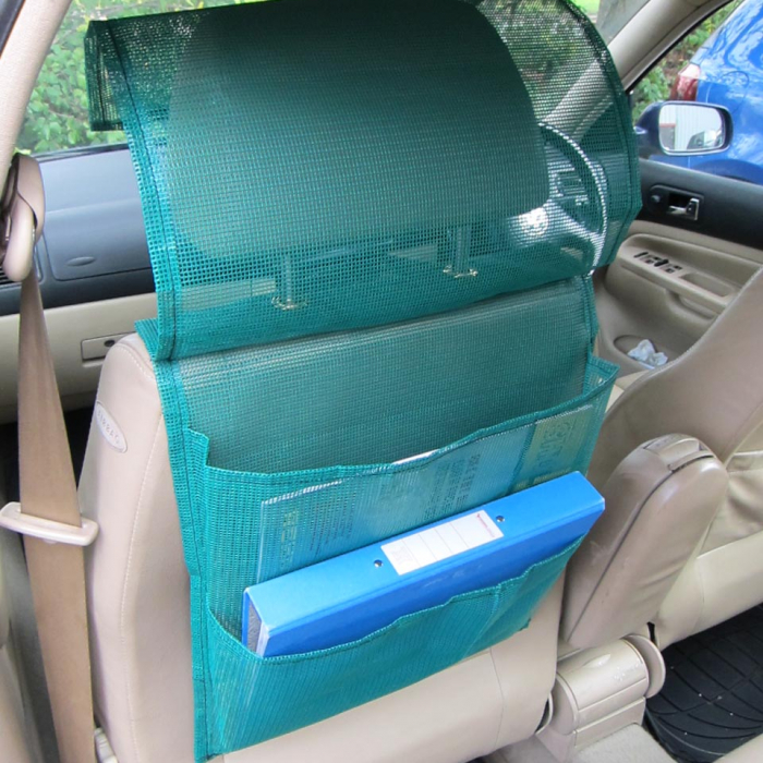 Open view of a bespoke green mesh document pocket organiser for use behind a car seat or in a commercial vehicle.