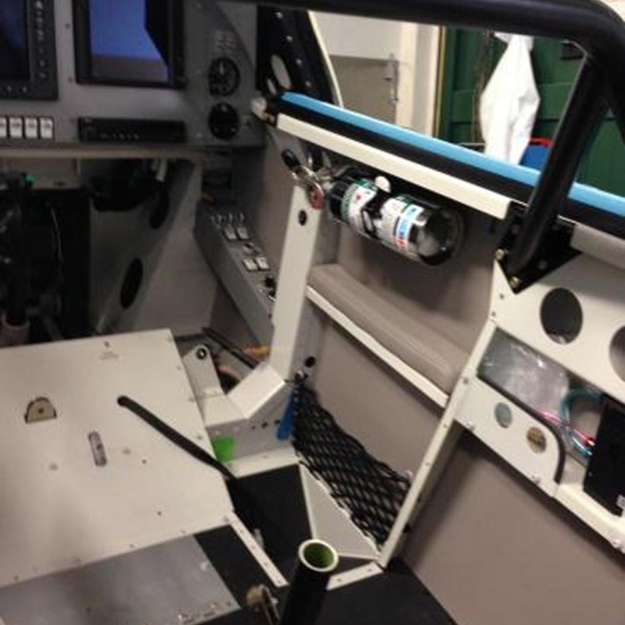 Custom-made frame elastic net designed to provide some storage for a personal aircraft