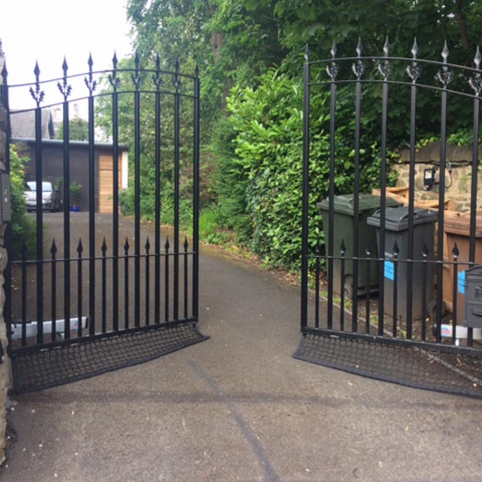 Bespoke net made to fit under gate