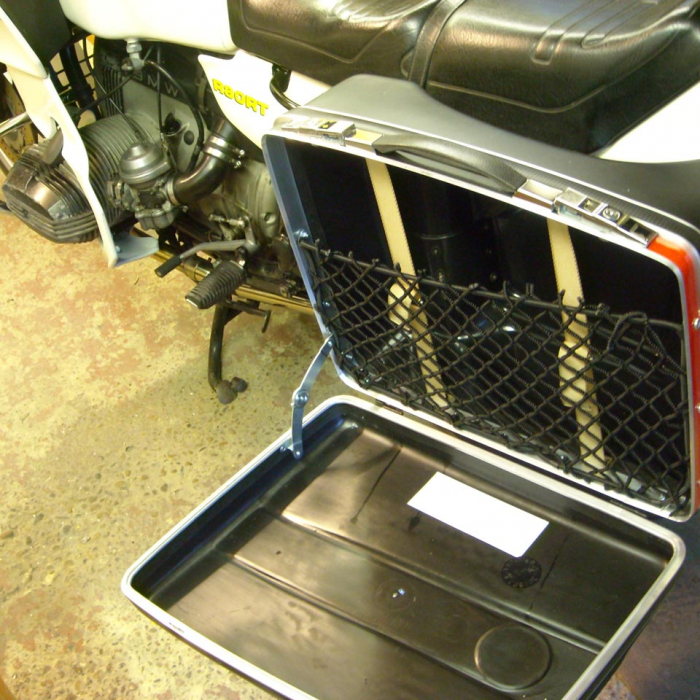 Bespoke frame elastic net to fit within a metal motorcycle pannier to provide additional storage space