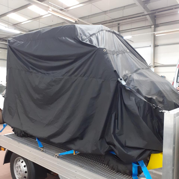 Bespoke load control cover for a car on the back of a truck