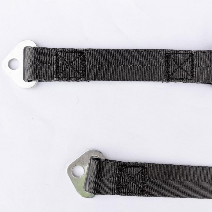 Close-up of anchor plates and side release buckle on a custom-made webbing strap.